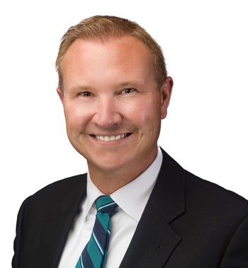 Portrait of Justin Paulhamus, Broker